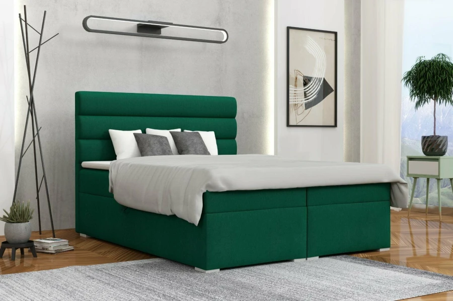 Dunkelgrünes Boxspringbett als stilvoller Blickfang in modernem Schlafzimmer.