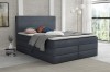 Hochwertiges Boxspringbett in Dunkelblau mit passendem Topper und modernem Polster-Kopfteil.