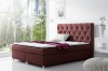 Bordeauxrotes Boxspringbett mit dekorativen Kristallen und komfortabler Matratze.