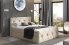 Modernes Polsterbett in Beige mit eleganter Rautensteppung im stilvollen Schlafzimmer.