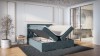 Petrolfarbenes Boxspringbett mit geöffneten Staufächern und dekorativer Rautensteppung.