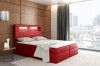 Rotes Boxspringbett mit LED-Kopfteil als farbenfroher Akzent im Schlafzimmer.