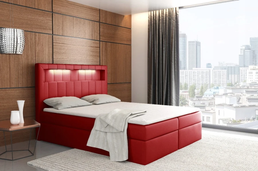 Rotes Boxspringbett mit LED-Kopfteil als farbenfroher Akzent im Schlafzimmer.