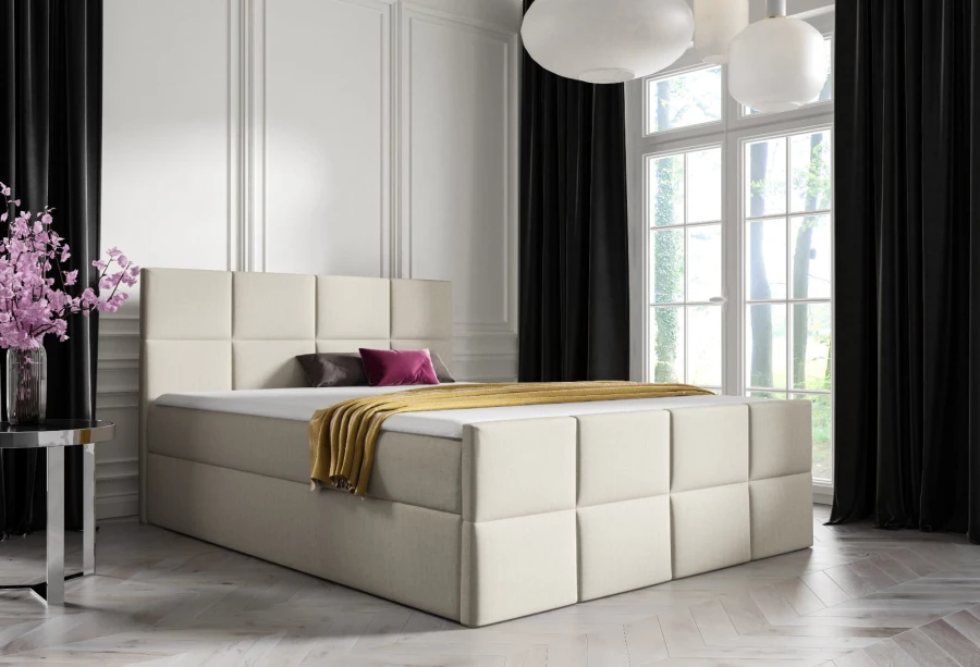 Modernes beiges Boxspringbett mit quadratisch gestepptem Kopfteil