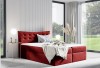 Rotes Boxspringbett mit Samtbezug und Knopfheftung im Schlafzimmer