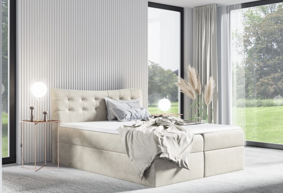 Gemütliches Boxspringbett in Beige aus weichem Samt, perfekt für ein helles und modernes Schlafzimmer-Design.