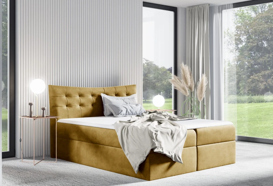 Stilvolles senfgelbes Boxspringbett in einem hellen, modernen Schlafzimmer-Ambiente.