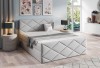 Hellgraues Boxspringbett mit elegantem Rauten-Design im modernen Schlafzimmer-Ambiente.