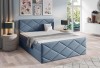 Blaues Polsterbett mit dekorativer Steppung im Rauten-Design für ein modernes Ambiente.