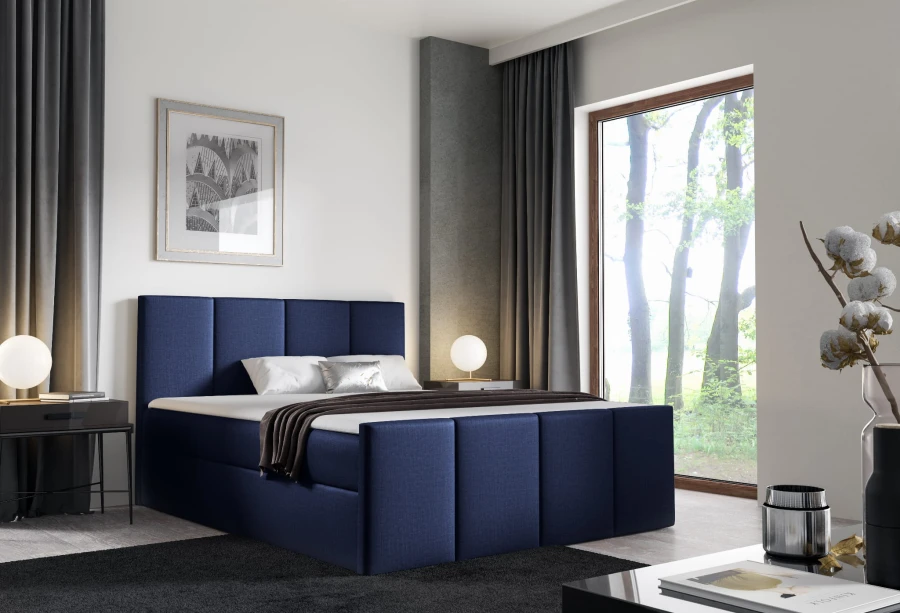 Dunkelblaues Polsterbett mit hohem Kopfteil in einem hellen, modern eingerichteten Schlafzimmer.