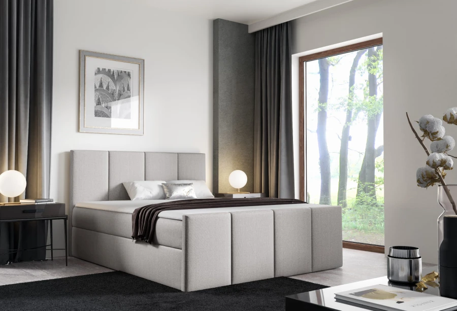 Beiges Polsterbett im Boxspring-Stil für ein gemütliches Schlafzimmer.