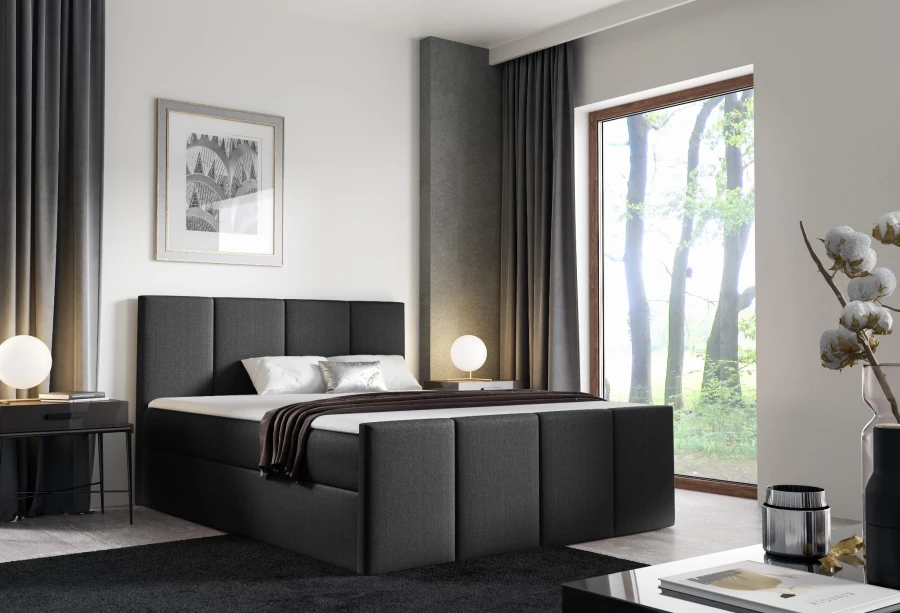 Anthrazitfarbenes Boxspringbett für ein exklusives Schlafzimmer.