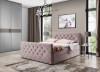 Modernes Polsterbett in Rosa mit Rautensteppung und Kristallen im stilvollen Schlafzimmer.