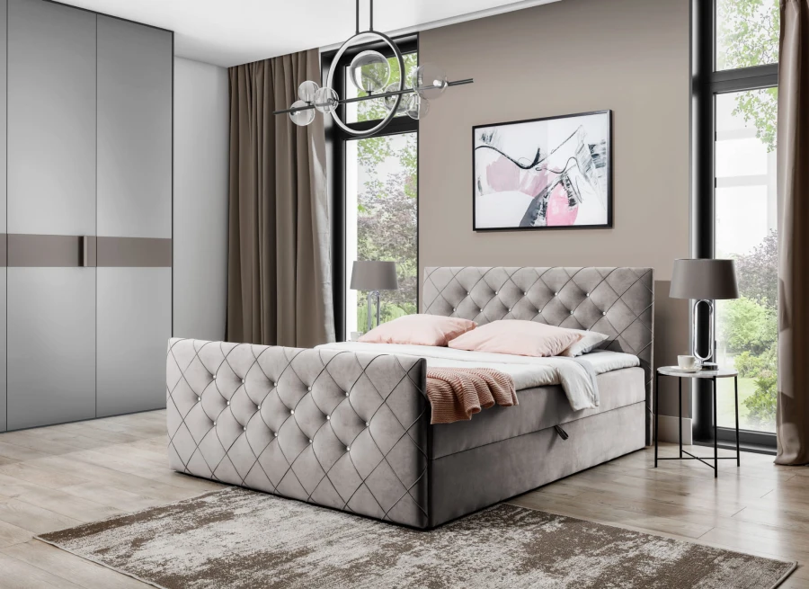 Graues Boxspringbett mit gestepptem Kopfteil und Fußteil im modernen Schlafzimmer.