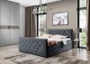 Dunkelgraues Polsterbett mit eleganter Rautensteppung und Bettkasten für das Schlafzimmer.