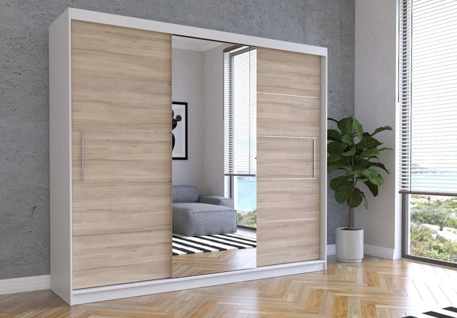 Moderner weißer Schwebetürenschrank mit Eiche-Optik und großem Spiegel für das Schlafzimmer.
