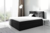 Anthrazitfarbenes Boxspringbett mit weißem Topper und stilvollem Kopfteil.