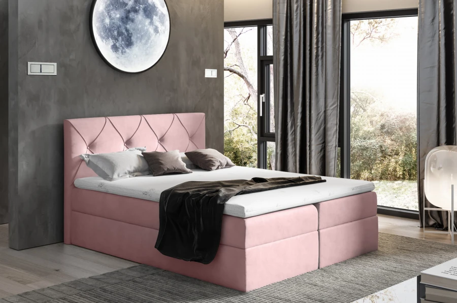 Rosa Boxspringbett mit gepolstertem Kopfteil in modernem Design.