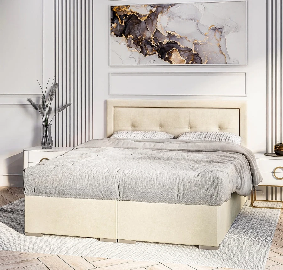 Modernes beiges Polsterbett mit gestepptem Kopfteil im elegant eingerichteten Schlafzimmer.