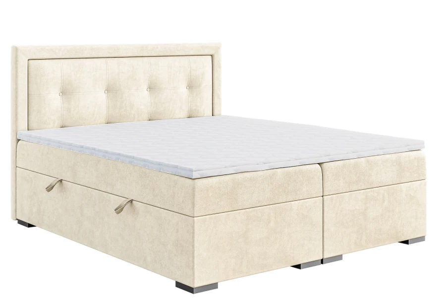 Klassisches beiges Boxspringbett mit Matratzentopper und gepolstertem Kopfteil freigestellt.