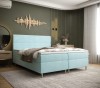 Stilvolles Boxspringbett in Hellblau sorgt für eine frische Atmosphäre im Schlafzimmer.