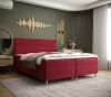Rotes Boxspringbett in elegantem Schlafzimmer mit Wandleuchten