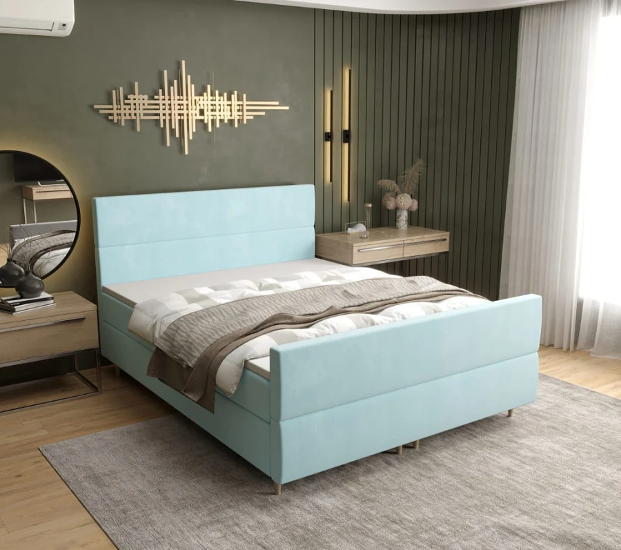 Hellblaues Boxspringbett sorgt für frisches Design im modernen Schlafzimmer.