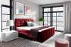 Elegantes rotes Polsterbett für ein modernes Schlafzimmer-Ambiente.