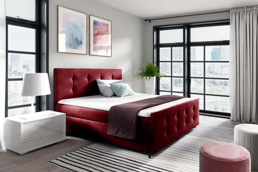 Elegantes rotes Polsterbett für ein modernes Schlafzimmer-Ambiente.