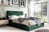 Grünes Boxspringbett mit gestepptem Kopfteil in stilvollem Design