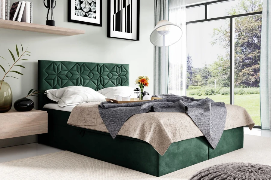 Grünes Boxspringbett mit gestepptem Kopfteil in stilvollem Design