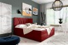 Rotes Boxspringbett mit gestepptem Kopfteil als farblicher Akzent im Schlafzimmer.