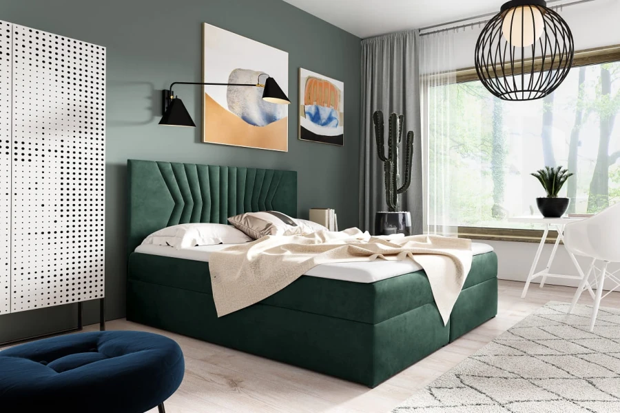 Modernes grünes Boxspringbett mit Samtbezug und dekorativem Kopfteil im Schlafzimmer.