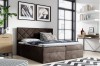 Dunkelbraunes Boxspringbett mit Rautensteppung am Kopfteil in modernem Schlafzimmer.