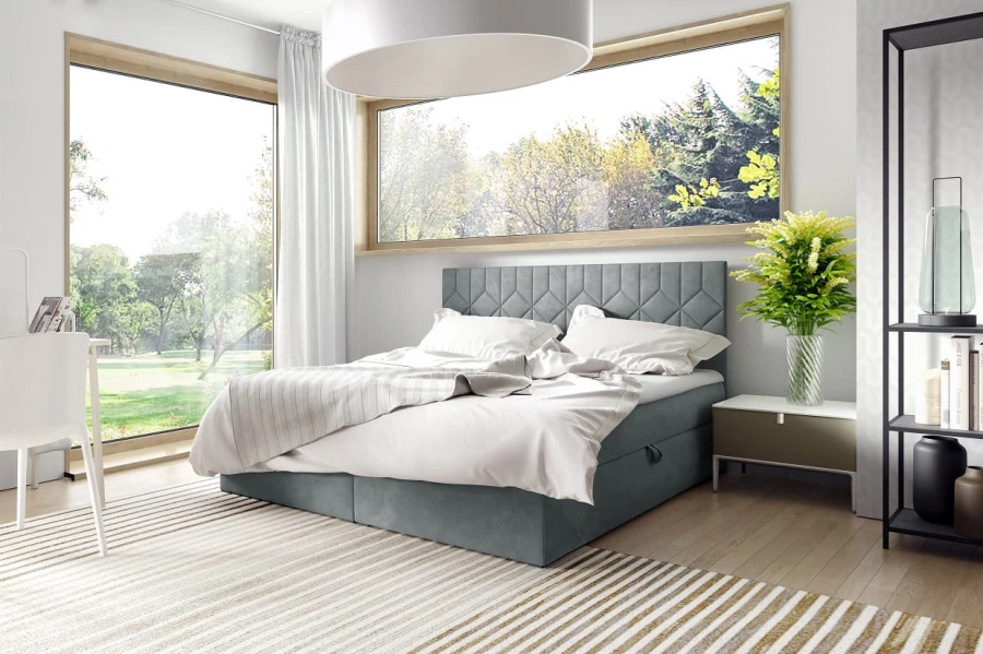 Graues Boxspringbett im skandinavischen Stil mit großem Fenster