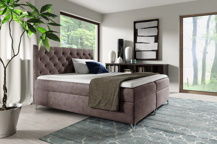Boxspringbett in Dunkelbraun mit stilvoller Knopfheftung am Kopfteil für gemütliche Schlafzimmer.
