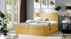 Elegantes gelbes Boxspringbett mit dekorativer Rautensteppung und Bettkasten.