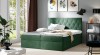 Dunkelgrünes Samt-Boxspringbett für ein luxuriöses Ambiente im Schlafzimmer.