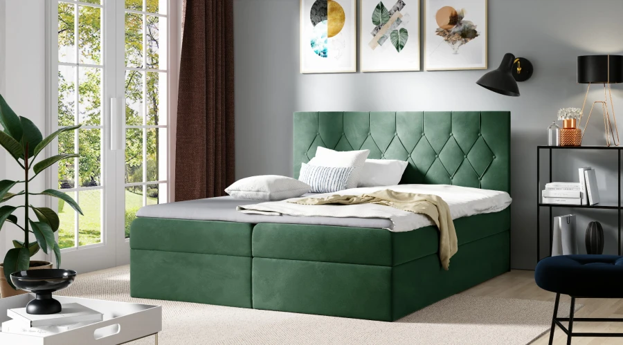 Dunkelgrünes Samt-Boxspringbett für ein luxuriöses Ambiente im Schlafzimmer.