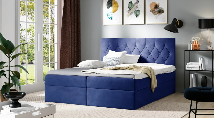 Modernes blaues Boxspringbett mit hohem Kopfteil und weichem Samtbezug.