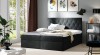 Elegantes schwarzes Boxspringbett mit Rautensteppung am Kopfteil