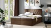 Braunes Boxspringbett mit hochwertiger Polsterung und Stepp-Kopfteil