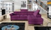 Modernes lilafarbenes Ecksofa in einem hellen Wohnzimmer mit Loft-Ambiente.