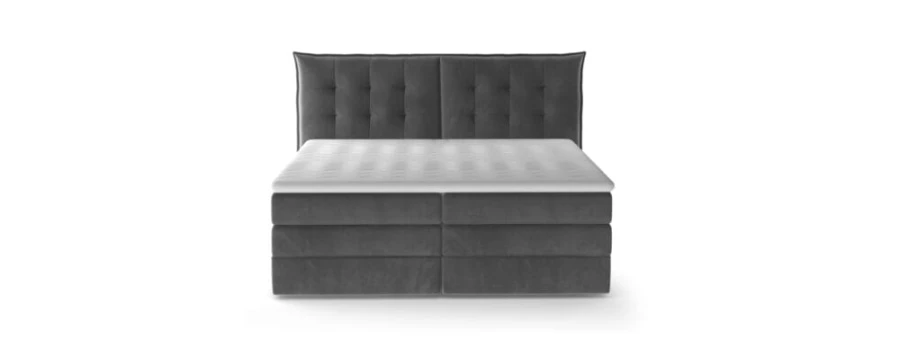 Modernes graues Boxspringbett in Frontalansicht auf weißem Hintergrund.