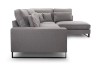 Seitenansicht eines modernen grauen Ecksofas mit schwarzen Metallfüßen.