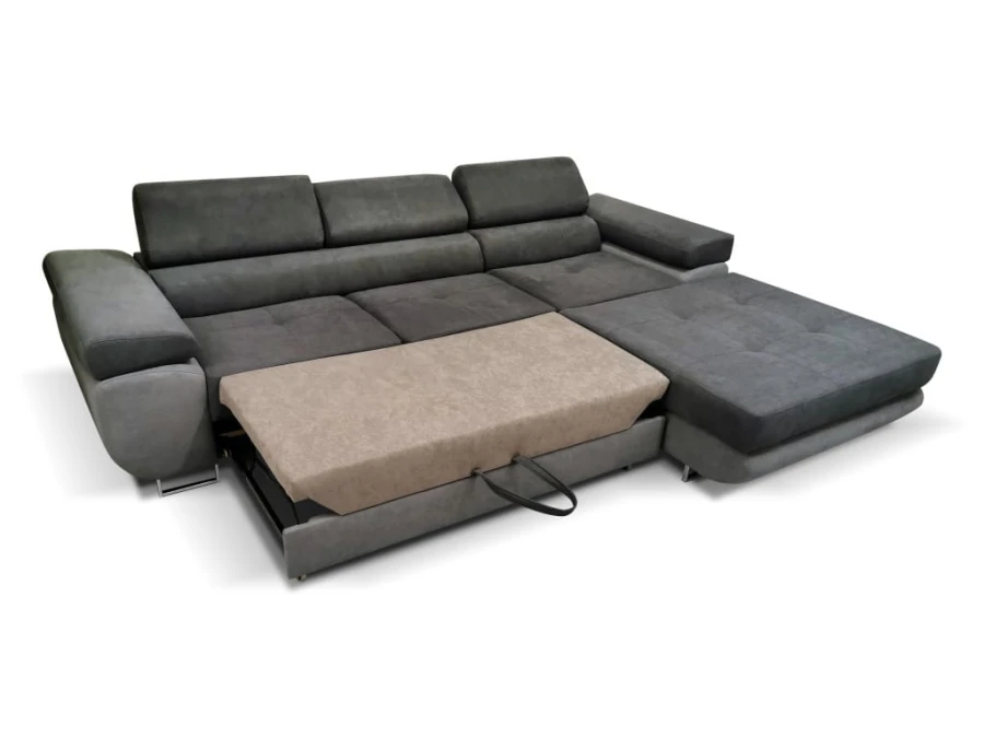 Ecksofa in Grau mit ausgezogener Schlaffunktion für Gäste.