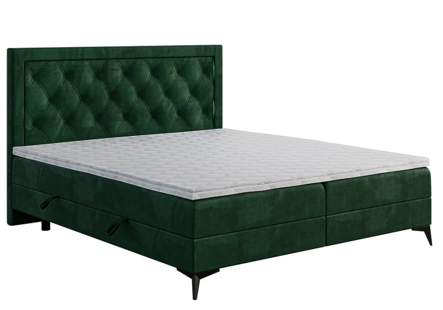 Grünes Boxspringbett aus hochwertigem Samt mit bequemer Matratze und Topper.