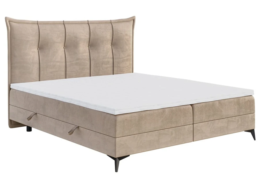 Elegantes beige gepolstertes Boxspringbett mit hohem Kopfteil und weißem Topper.
