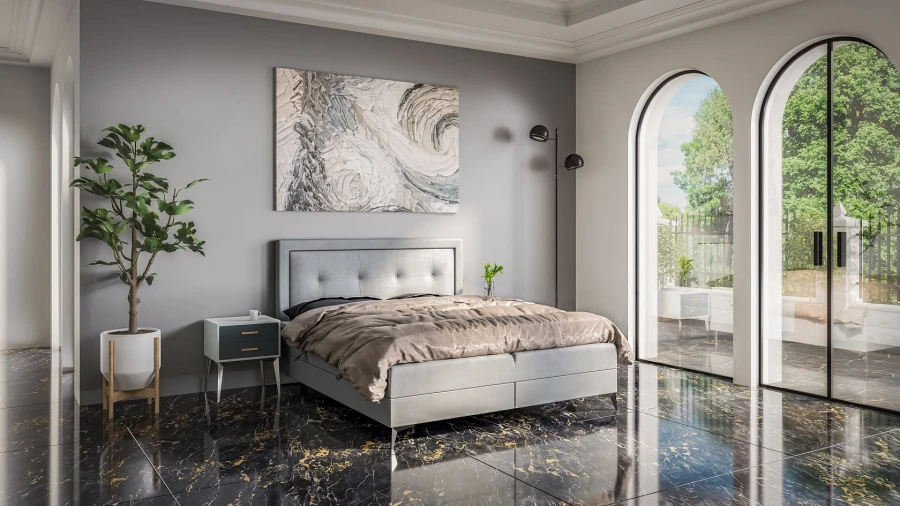 Komplett bezogenes graues Boxspringbett in luxuriösem Schlafzimmer-Ambiente.