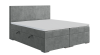 Graues Boxspringbett mit Bettkasten, hohem Kopfteil und Topper vor weißem Hintergrund.